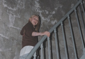 Johanna going up the stairs of the lighthouse