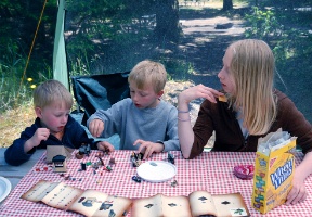 Antti, Tuomas and Johanna playing with legos