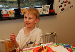 Antti waiting to blow the candles on his cake