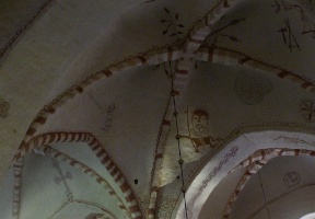 Saint Hubertus (the patron saint of hunters, mathematicians, opticians and metalworkers) is to the left of center with his long horn.